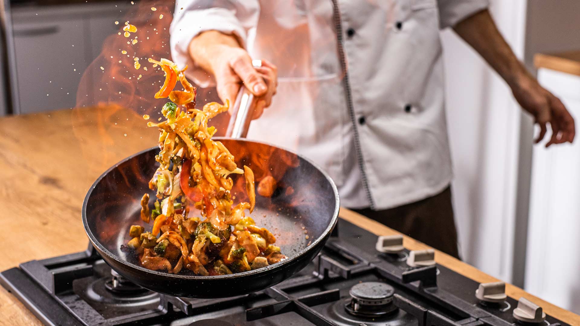 Ingredients in a frying pan being tossed