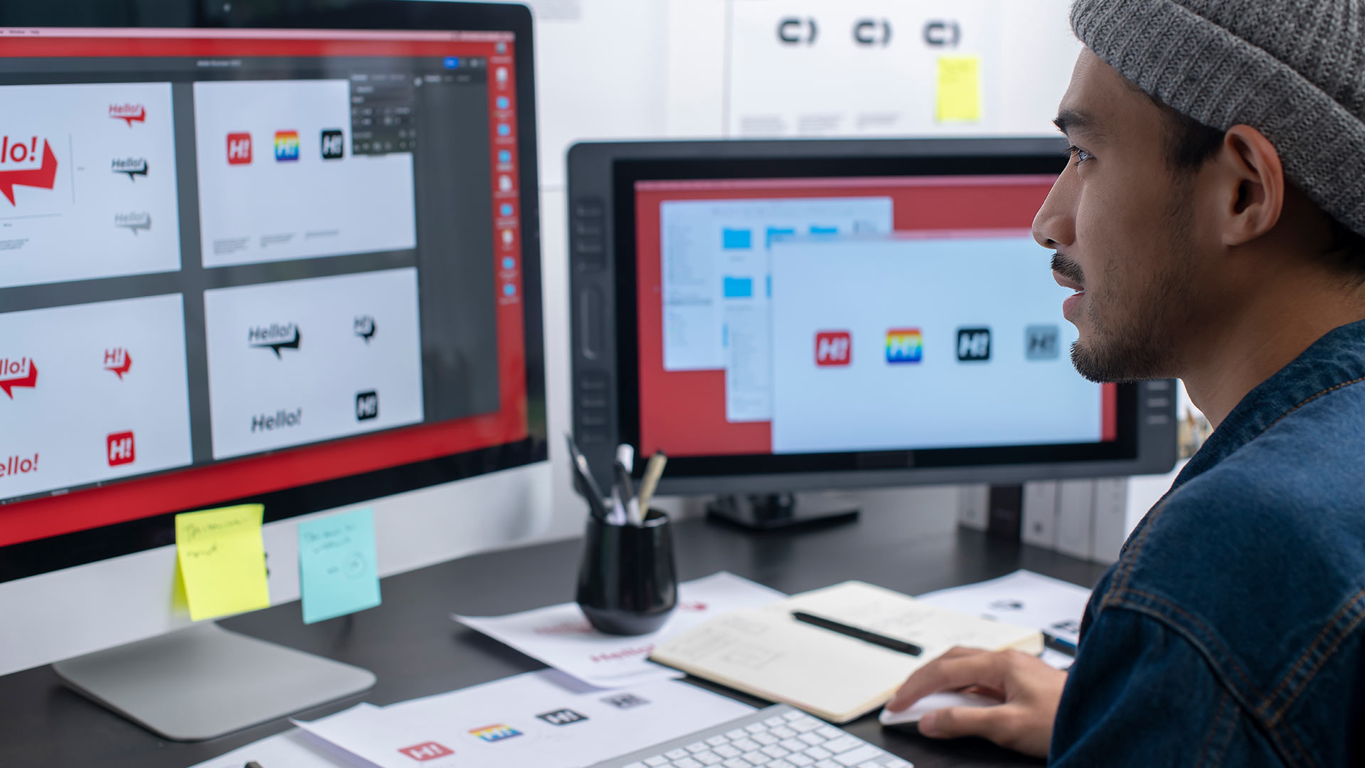 Man at a computer working on interface elements